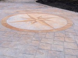 imprinted concrete paving with compass design